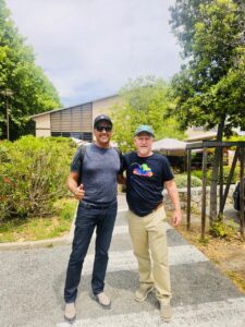 Bruce Goldsmith with Avi Malik of Temple Pilots in France