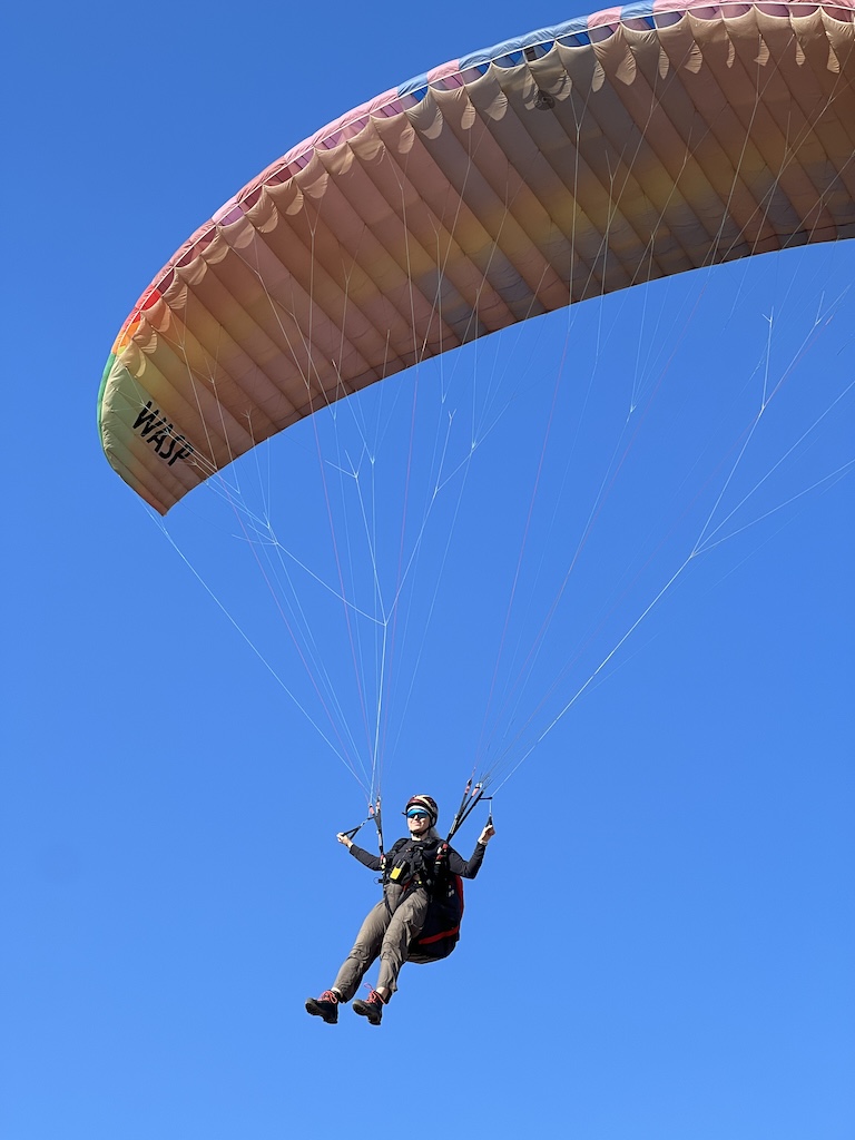 Emmilie from Uk in FLight during her 10 day course paragliding